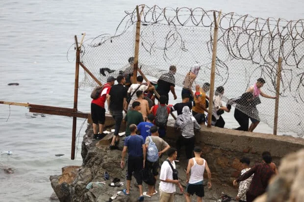EU grapples with migrant crisis in Spain's N. Africa enclave