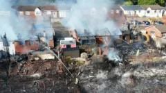 Streets evacuated after massive fire destroys homes