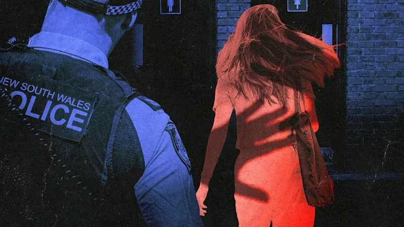 A student was led into a toilet block by police. She says she was raped