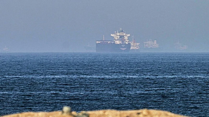 Cargo ship ‘hit by projectile’ as Iran and US argue over talks