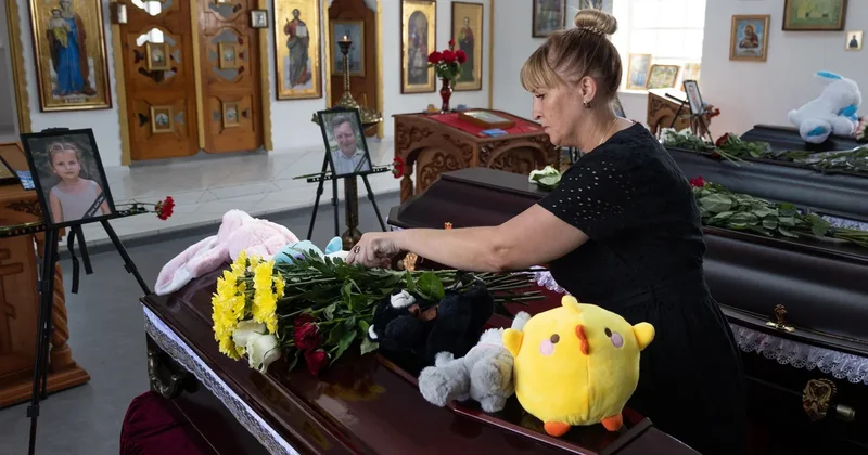 Funeral held for family "wiped off the map" in Russian strike