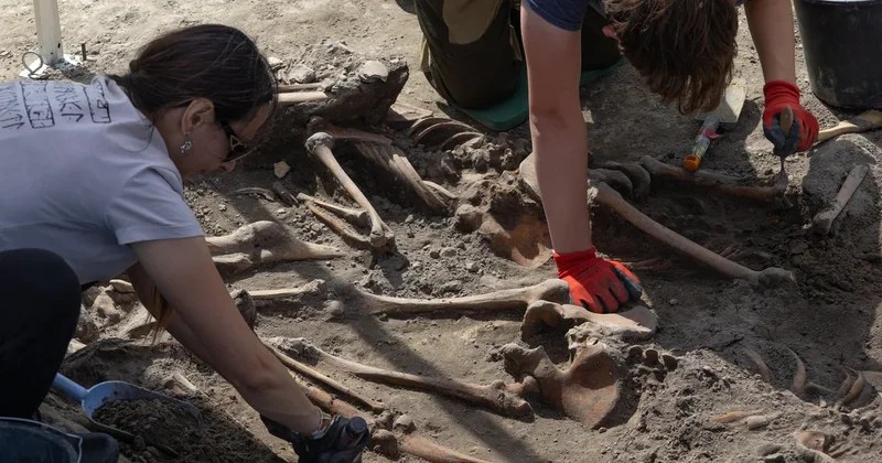 Human remains exhumed at WWII massacre site in Ukraine