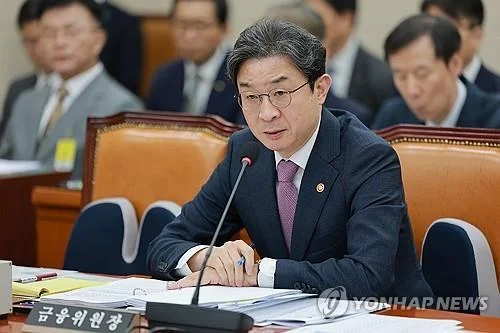 Chief regulator vows to keep vigilant over household debts