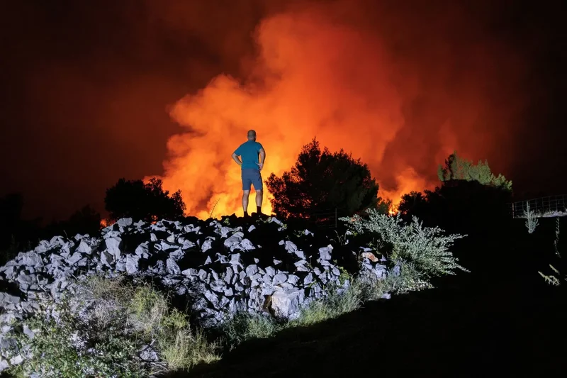 Wildfires rage across Europe as heatwaves drive record temperatures