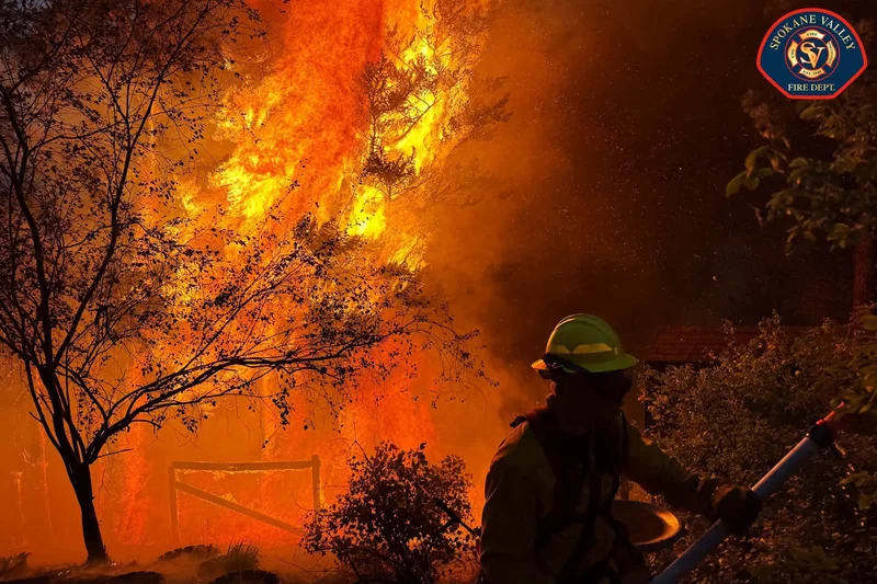 Arson suspect arrested as wildfires rage around Spokane, Washington
