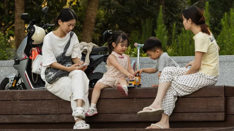 Is China’s party newspaper carrying more stories highlighting women’s role as mothers?
