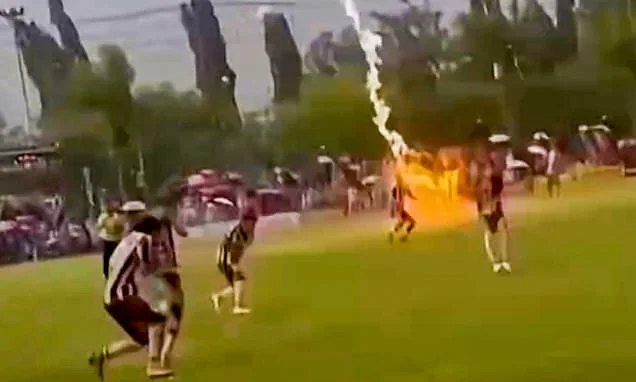Lightning strike kills footballer and injures 12 others during match