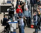 ‘They’re selling the safety of the traveling public’: TSA workers decry Trump privatization push