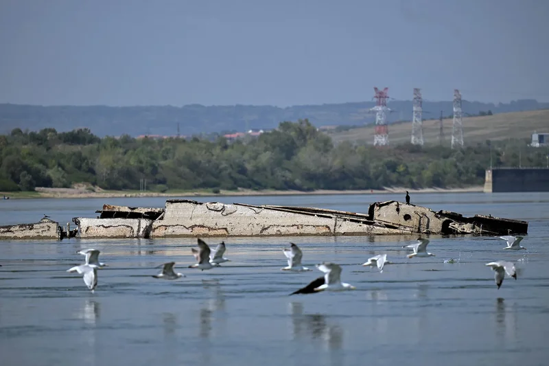 Danube River’s shrinking water levels expose dozens of World War II ships