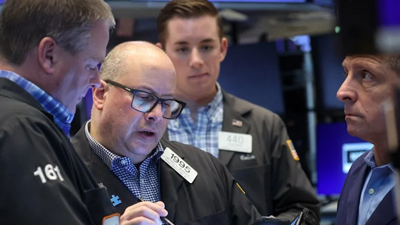 ASX slides lower in early trade; Wall Street hits record