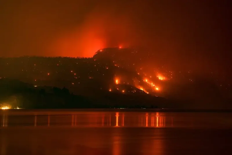 Why information officer kept camera rolling even as he fled B.C. wildfire with family