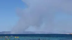 Two dead and evacuation under way as fires break out on Greek island