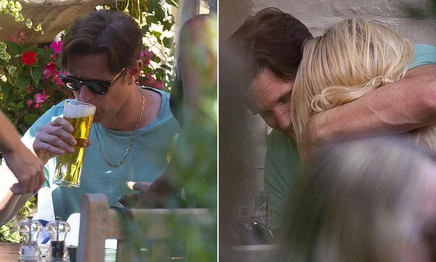 Matt Smith cosies up to fashion designer Jessica Horwell as they enjoy a pint during boozy evening at pub in Highgate