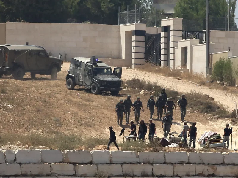 Israeli settlers besiege Palestinian families in West Bank’s Qusra
