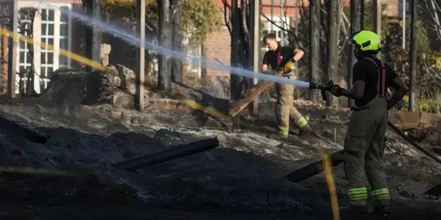 UK firefighters 'under significant pressure' as multiple blazes rage