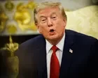Trump tells CNN reporter to 'be quiet' during Oval Office clash – video