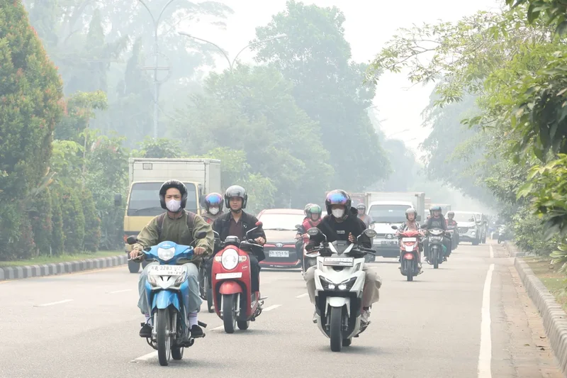 Indonesia warns against starting open blazes as haze from wildfires spreads to Malaysia