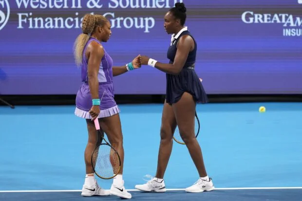 Serena and Venus Williams return, lose close doubles in Cincinnati