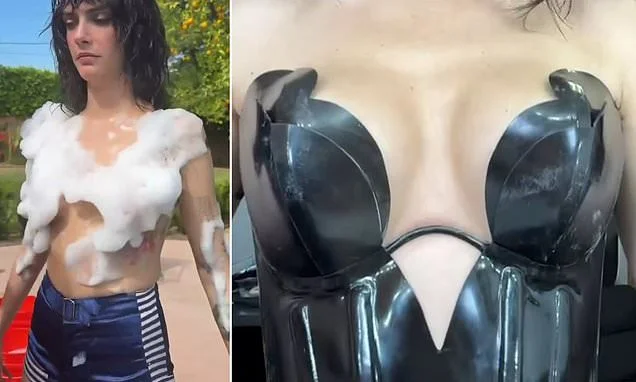 Cara Delevingne goes topless with just bubbles protecting her modesty before showing off her cleavage in racy PVC bustier in series of sexy videos