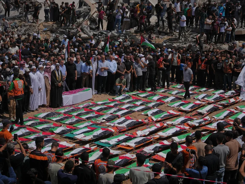 Photos: Thousands in Gaza City join mass funeral for 112 Palestinians