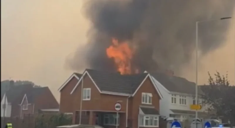 Multiple houses ablaze as wildfire sweeps into UK town