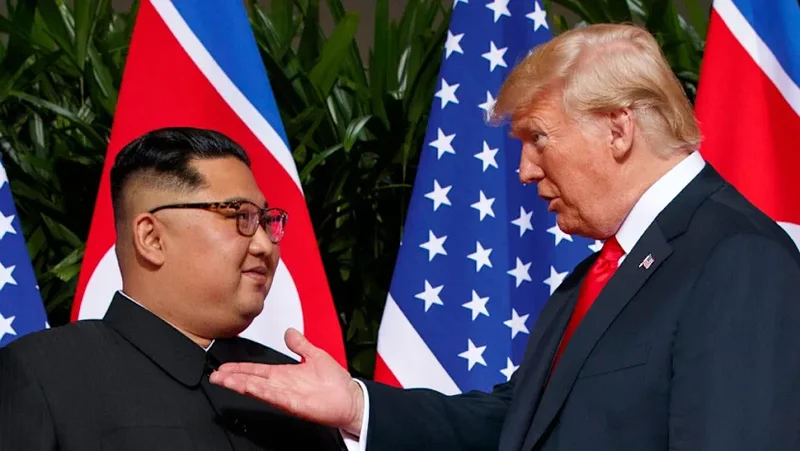 Trump hints at Kim contacts after scaling back Seoul drills