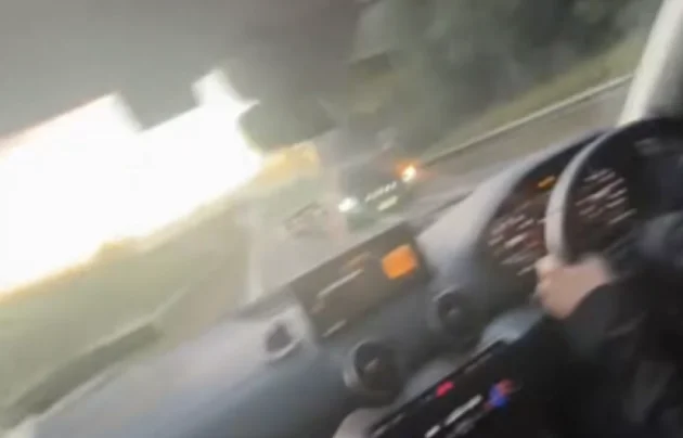 What's the official advice for drivers if you meet a car speeding the wrong way towards you?