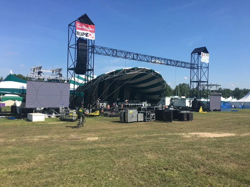 Edmonton’s summer of rain has Folk Fest trucking in sand, Fringe hiring meteorologist