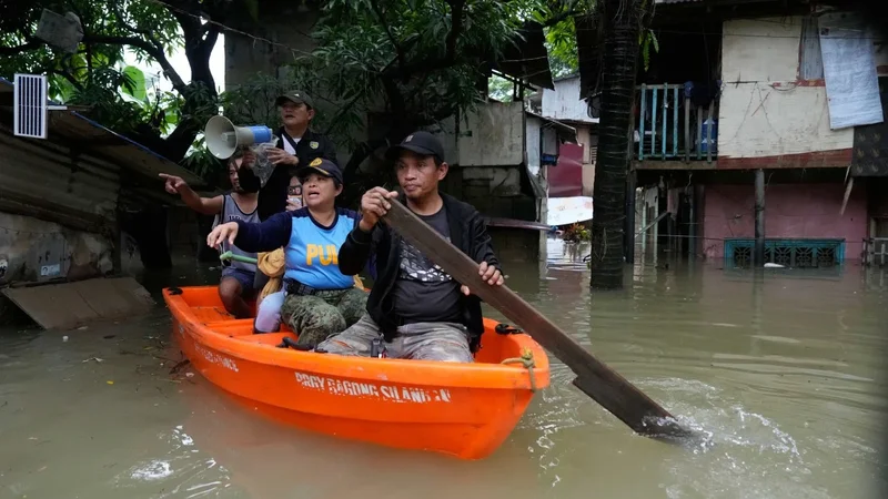 Philippines floods, landslides, kill at least 12, 8 missing