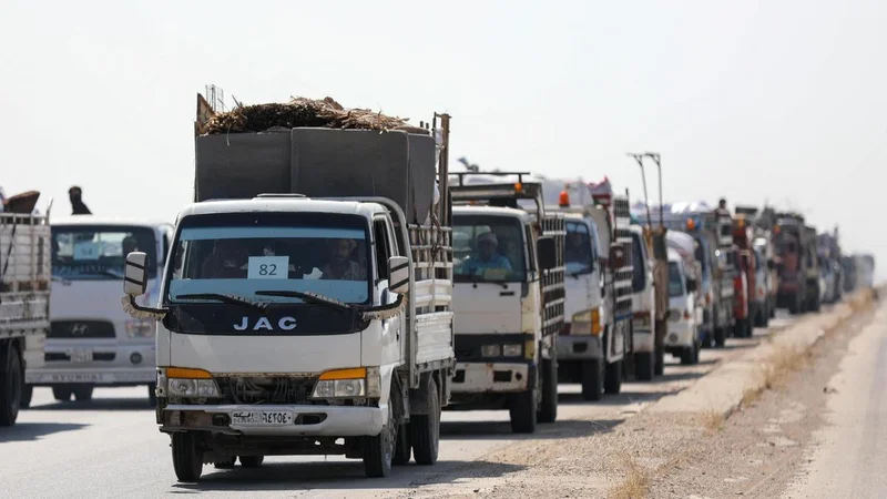 Hundreds of Syrian Kurds head back to border town after years of displacement