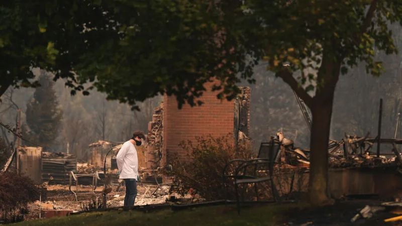 US northwest wildfires force 65,000 to flee as hundreds of buildings burn in Spokane