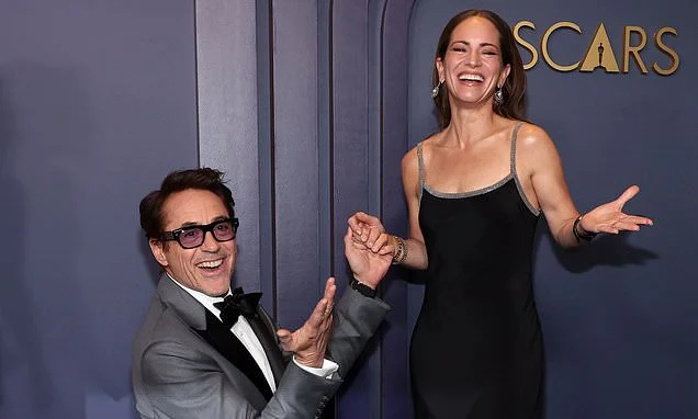 As Robert Downey Jr signs £75million deal to become the highest paid movie star EVER, meet the wife who dragged the drug-addled Iron Man star back from the brink