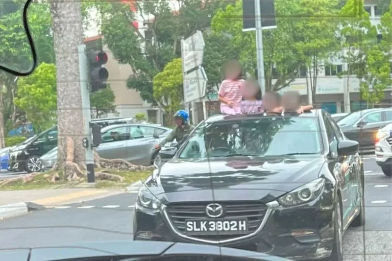 Kids seen standing through GetGo car’s sunroof; firm warns of penalties for unsafe driving