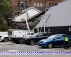 Two men seriously injured after Sydney building suddenly collapses
