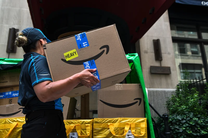 Stocks making the biggest moves midday: Amazon, Corning, CoreWeave, Bristol Myers & more