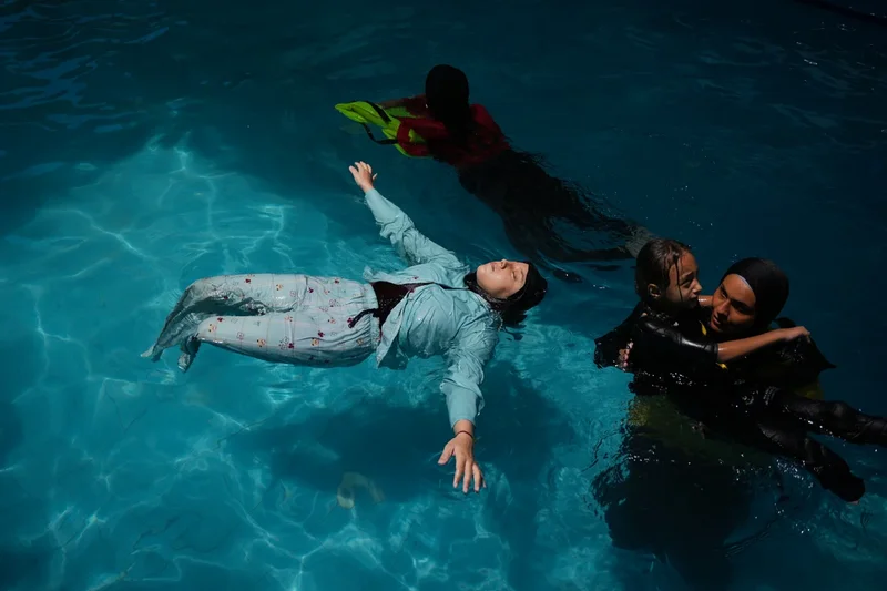 Palestinian children who lost limbs in the Israel-Hamas war learn to swim in Gaza