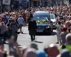 Thousands of Bonnie Tyler fans gather to pay respects as coffin brought home
