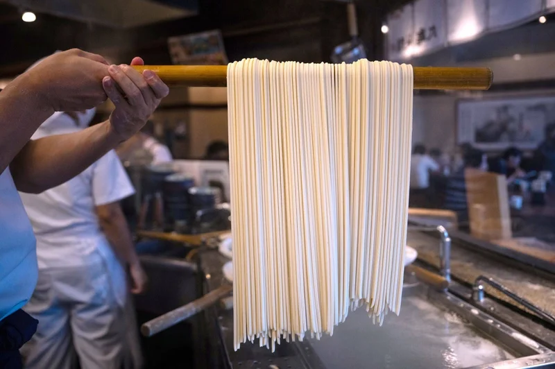 Udon billionaire bets that thick noodles will win over Americans
