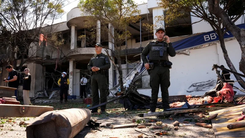 Truck explodes outside Colombia police base, injuring 11 officers and killing a dog