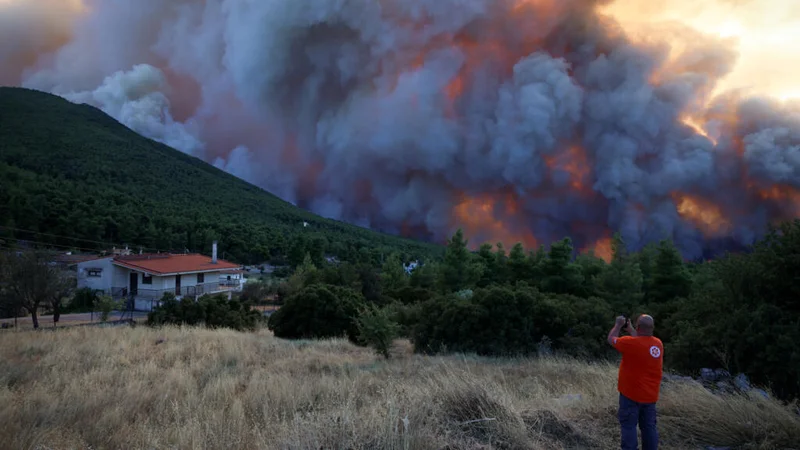 In blazing Greece, anger grows among residents forced to evacuate