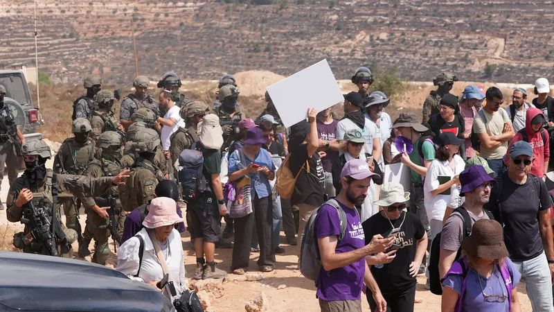 Israeli soldiers prevent aid delivery to besieged Palestinians