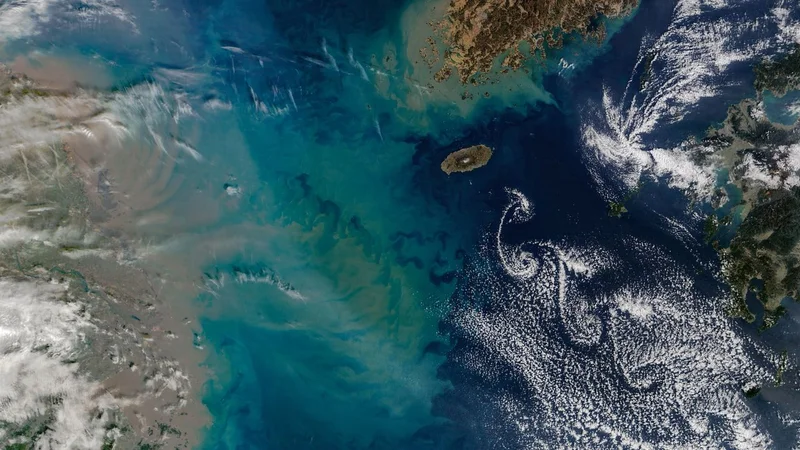 Giant underwater plume blasts into swirling cloud 'street' in the East China Sea — Earth from space