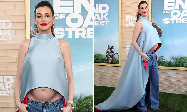 Anne Hathaway, 43, roasted over 'ridiculous' maternity outfit as she shows off baby bump at LA premiere