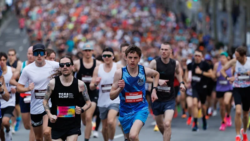 Win City2Surf, turn around, run 14km back: a champion’s Sunday schedule