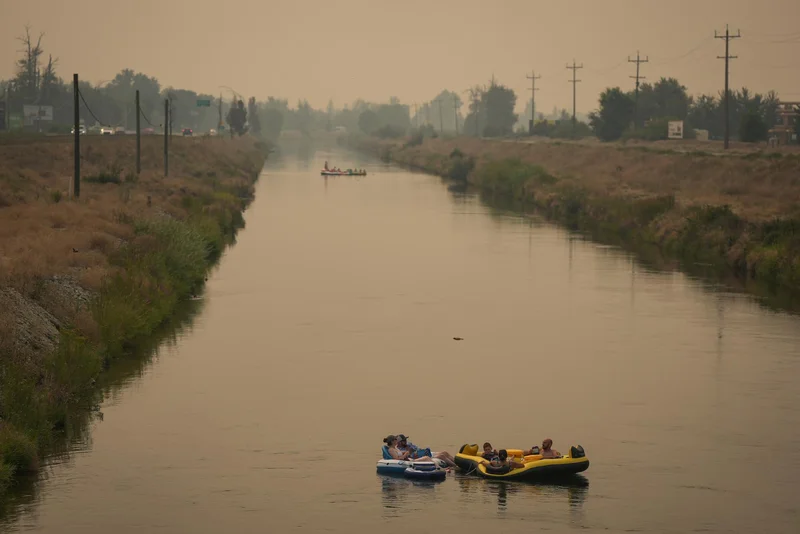 Wildfire in western Canada that forced 20,000 to flee grew overnight