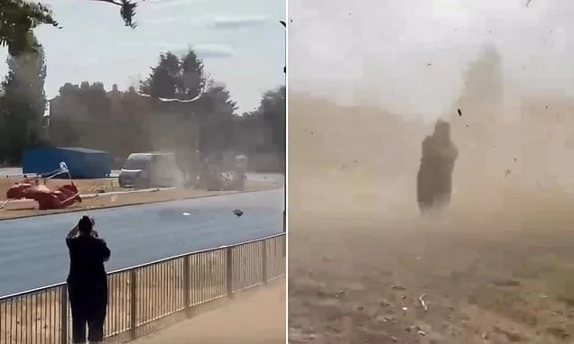 Moment mini-TORNADO rips through athletics meeting throwing tables, chairs and even officials into the air