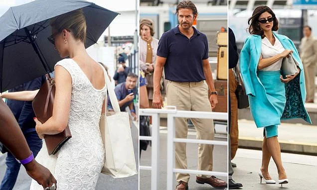 Margot Robbie looks elegant in white as she joins Bradley Cooper and Monica Barbaro on the set of the Ocean's Eleven prequel for the first time