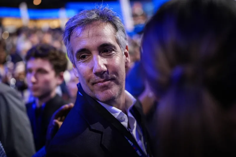 Trump’s ex-fixer Michael Cohen chooses bizarrely violent gun analogy to tease his ‘impossible reunion’ with president