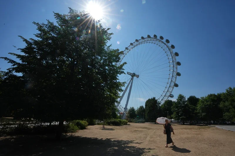 Britain records its hottest day of the year as summer heat grips parts of Europe, in photos