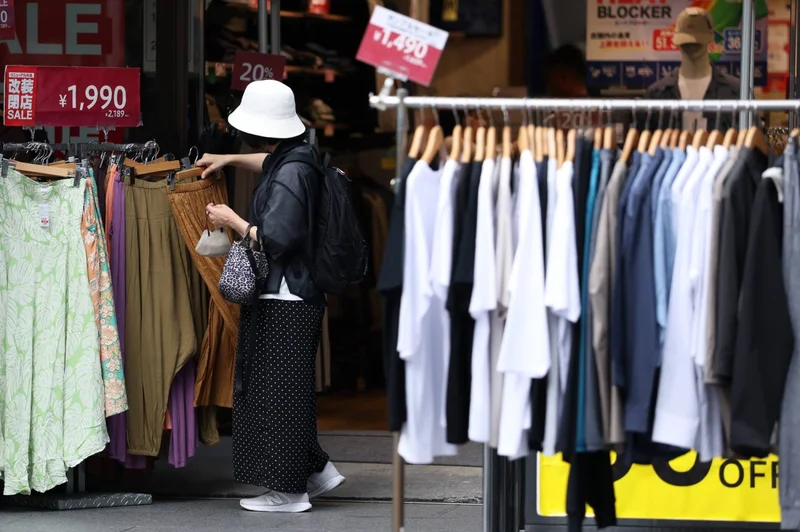 Japan’s households continue to cut spending amid persistent inflation